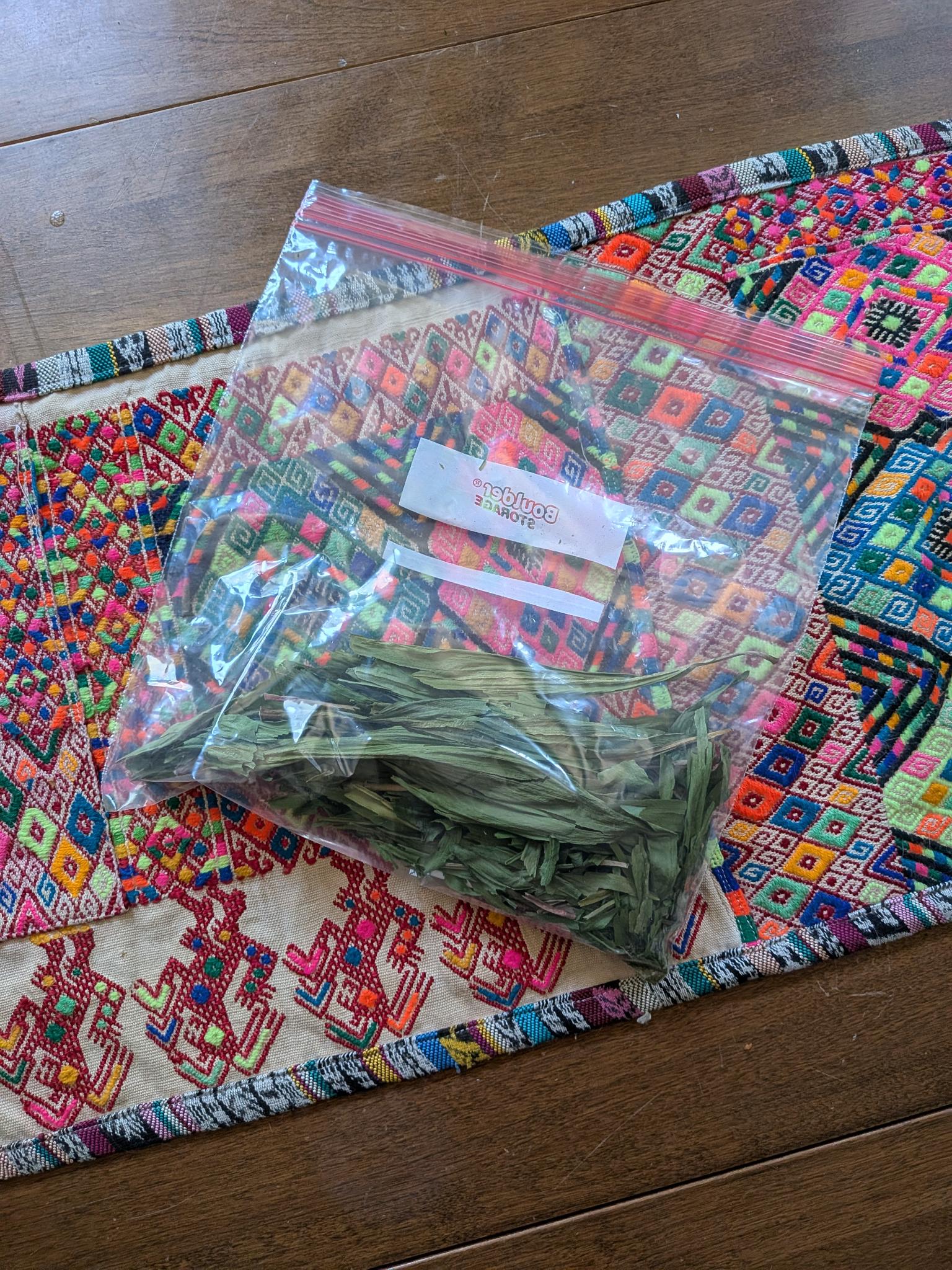 Dried ramp greens in a labeled storage bag