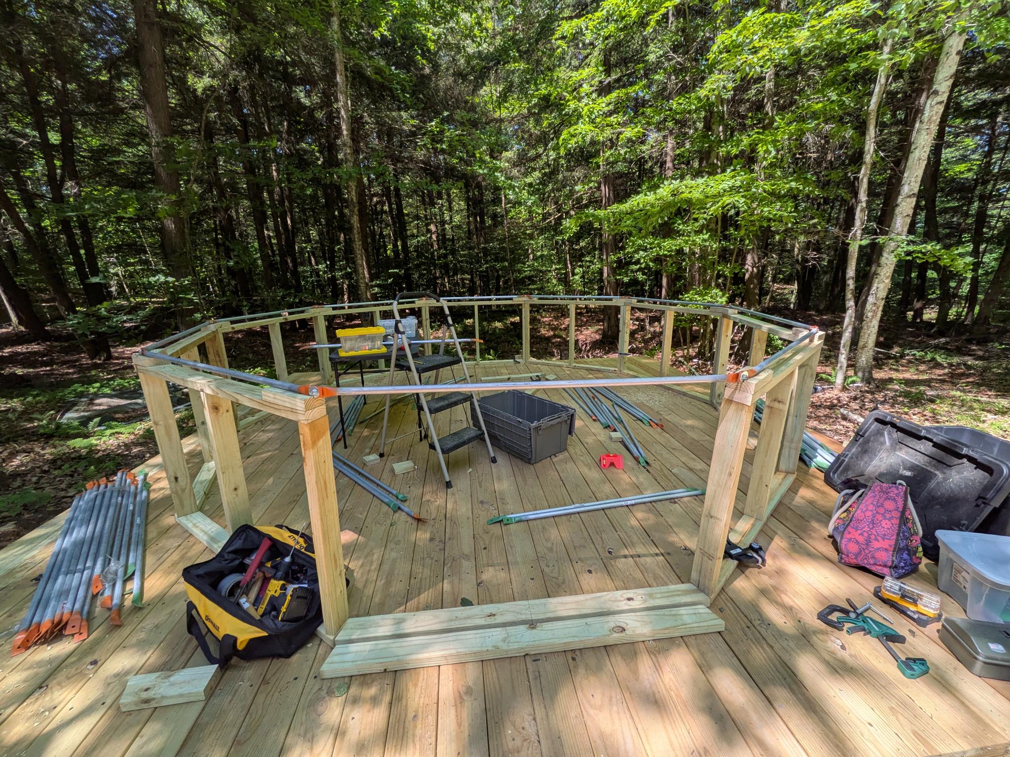 Base framing with tools and hardware on the deck