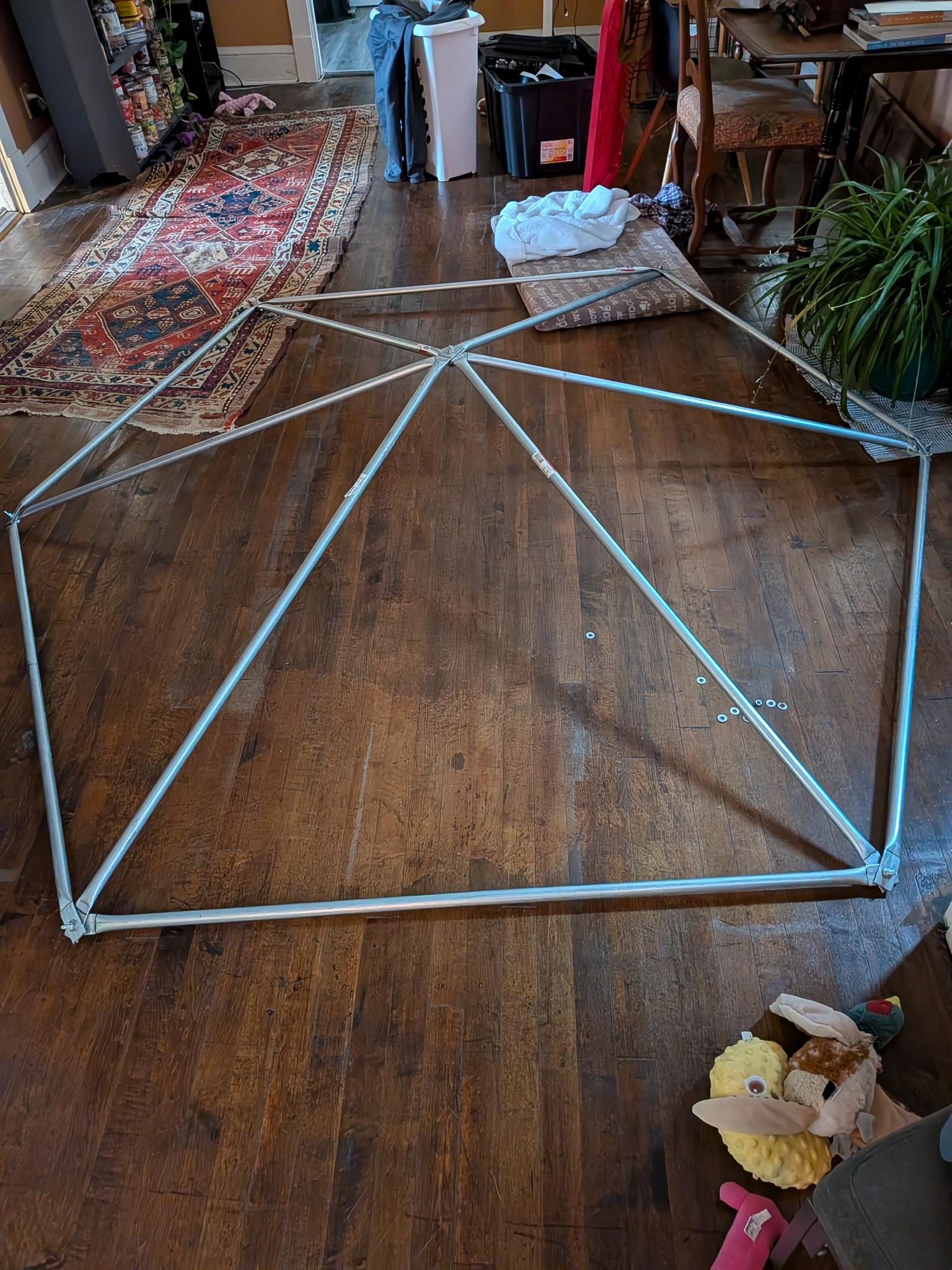 Base ring of the dome test-assembled on an apartment floor